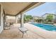 Relaxing outdoor pool with a covered patio and mature plants at 4803 E Barwick Dr, Cave Creek, AZ 85331