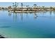 Aerial view of lakefront property with lush landscaping and boats at 10330 W Thunderbird Blvd # C115, Sun City, AZ 85351