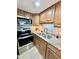 Modern kitchen with stainless steel appliances and granite countertops at 10330 W Thunderbird Blvd # C115, Sun City, AZ 85351