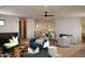 Relaxing game room with fireplace and multiple seating areas at 29646 N 109Th Pl # 128, Scottsdale, AZ 85262