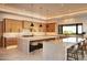 Modern kitchen with large island and breakfast bar at 29646 N 109Th Pl # 128, Scottsdale, AZ 85262