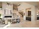Spacious living room with a two-story high ceiling and fireplace at 29646 N 109Th Pl # 128, Scottsdale, AZ 85262