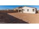 Large backyard, ready for landscaping at 40347 W Wade Dr, Maricopa, AZ 85138