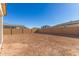 Large backyard with a block wall at 40347 W Wade Dr, Maricopa, AZ 85138