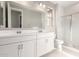 Modern bathroom features double vanity and a separate shower at 40347 W Wade Dr, Maricopa, AZ 85138