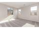 Bright bedroom with two windows and carpet flooring at 40347 W Wade Dr, Maricopa, AZ 85138