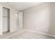 Spacious bedroom with neutral walls, carpet, and a large closet at 40347 W Wade Dr, Maricopa, AZ 85138