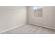 Simple bedroom with neutral walls and carpet flooring at 40347 W Wade Dr, Maricopa, AZ 85138