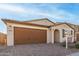 Two-story home with a 2-car garage at 40347 W Wade Dr, Maricopa, AZ 85138