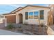 Beautiful curb appeal with landscaping at 40347 W Wade Dr, Maricopa, AZ 85138