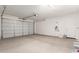 Attached garage with ample space for parking and storage at 40347 W Wade Dr, Maricopa, AZ 85138
