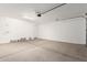 2-car garage with extra storage space at 40347 W Wade Dr, Maricopa, AZ 85138