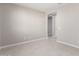 Spacious room with neutral walls and tile floors at 40347 W Wade Dr, Maricopa, AZ 85138