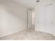 Bedroom features neutral walls, carpeted floors, closet with sliding doors, and an ensuite bathroom at 18812 E Elizar Dr, Gold Canyon, AZ 85118