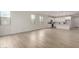 Bright open living space with large windows offering lots of natural light, and views into the kitchen at 18812 E Elizar Dr, Gold Canyon, AZ 85118