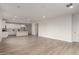 Open-concept living space featuring the kitchen with views into the living room, and recessed lighting at 18812 E Elizar Dr, Gold Canyon, AZ 85118