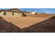 Large backyard with gravel and block wall at 40461 W Wade Dr, Maricopa, AZ 85138