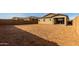 Large backyard with gravel and block wall at 40461 W Wade Dr, Maricopa, AZ 85138