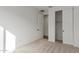 Bright bedroom featuring carpet flooring and closet at 40461 W Wade Dr, Maricopa, AZ 85138