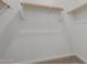 Large closet with double hanging rods and shelving at 40461 W Wade Dr, Maricopa, AZ 85138