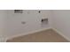 Laundry room with linoleum floor and hookups at 40461 W Wade Dr, Maricopa, AZ 85138