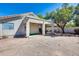 Backyard view of home with covered patio and putting green at 6145 E Sierra Morena St, Mesa, AZ 85215