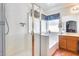 Clean bathroom with shower, tub, and wood vanity at 6145 E Sierra Morena St, Mesa, AZ 85215