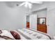 Bedroom with a queen bed, dresser, and ceiling fan at 6145 E Sierra Morena St, Mesa, AZ 85215