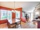 Bright dining area with a table for four and views to living room and kitchen at 6145 E Sierra Morena St, Mesa, AZ 85215