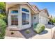 View of the home's exterior, highlighting a bay window at 6145 E Sierra Morena St, Mesa, AZ 85215