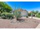 House with desert landscaping and a two-car garage at 6145 E Sierra Morena St, Mesa, AZ 85215