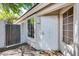 Front entrance with a decorative security door and walkway at 6145 E Sierra Morena St, Mesa, AZ 85215