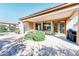 Landscaped backyard with patio and grill area at 29110 N 129Th Ave, Peoria, AZ 85383