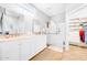 Bathroom boasts double vanity, walk-in shower, and large closet at 29110 N 129Th Ave, Peoria, AZ 85383