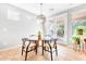 Bright dining area with glass table and patio access at 29110 N 129Th Ave, Peoria, AZ 85383