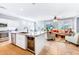 Open kitchen with island, stainless steel appliances, and granite counters at 29110 N 129Th Ave, Peoria, AZ 85383