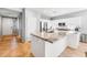 Modern kitchen with white cabinets, granite countertops, and stainless steel appliances at 29110 N 129Th Ave, Peoria, AZ 85383