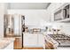 Stainless steel appliances and granite countertops in this kitchen at 29110 N 129Th Ave, Peoria, AZ 85383