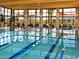 Indoor lap pool with large windows and plenty of natural light at 29110 N 129Th Ave, Peoria, AZ 85383