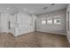 Bright and airy dining area featuring white cabinetry, and a view of the backyard at 12312 W Luxton Ln, Avondale, AZ 85323