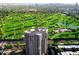 The building's rooftop offers expansive green golf course views, mature trees, and a tranquil pond at 1040 E Osborn Rd # 302, Phoenix, AZ 85014