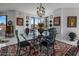 Elegant dining area with a glass-top table and rich rug at 1040 E Osborn Rd # 302, Phoenix, AZ 85014