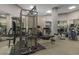Well-equipped fitness center with various weight machines, treadmills, and mirrors at 1040 E Osborn Rd # 302, Phoenix, AZ 85014