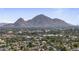Picturesque view featuring homes with large trees and a view of Camelback Mountain at 1040 E Osborn Rd # 302, Phoenix, AZ 85014