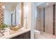 Stylish bathroom with glass bowl sinks and a large glass enclosed shower at 3965 E Sierra Vista Dr, Paradise Valley, AZ 85253