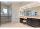 Spacious main bathroom with glass enclosed shower, dual sinks and vanity area at 3965 E Sierra Vista Dr, Paradise Valley, AZ 85253