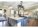 Gourmet kitchen featuring a large island and high-end appliances at 10287 E Diamond Rim Dr, Scottsdale, AZ 85255