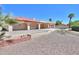 Spacious backyard featuring a large patio, refreshing pool, and low-maintenance desert landscaping at 2119 N Lake Shore Dr, Casa Grande, AZ 85122