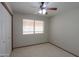 Bedroom featuring carpet, window, and neutral paint at 2119 N Lake Shore Dr, Casa Grande, AZ 85122