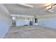 Spacious two car garage with white walls at 2119 N Lake Shore Dr, Casa Grande, AZ 85122